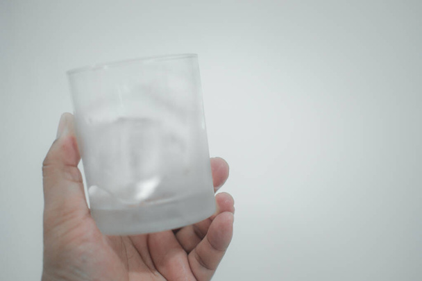 Person holding glass with . Close up - Photo, Image
