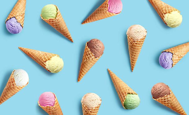 Colorful ice cream pattern on blue background, top view, flat lay - Foto, immagini