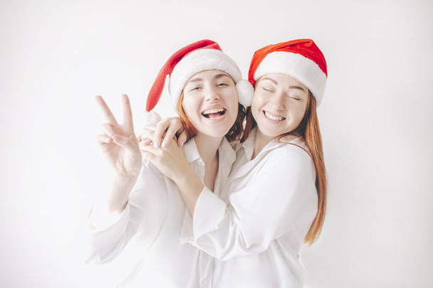 Merry Christmas and happy new year. Two women - Foto, imagen