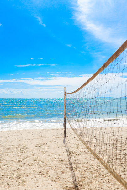 beach volleyball net on the beach with blue sky - Photo, Image