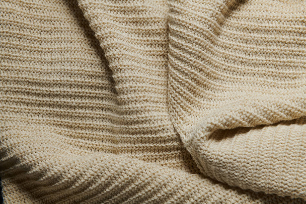 lana tejido de punto como fondo, color beige - Foto, Imagen
