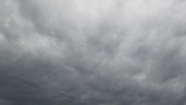 Scary dark sky with dramatic lights, puffy air with dense nimbostratus clouds, bad weather and storm coming in time lapse without birds - Footage, Video