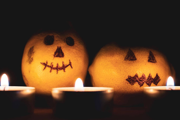 halloween jack o lantern drawings and candles in the dark - Photo, Image