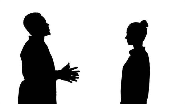 Silhouette Doctor telling good news and patient leaves. - Foto, imagen