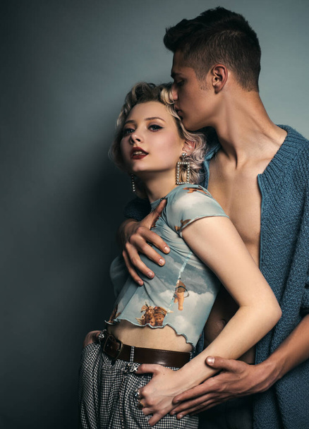 Hipsters love. Rock style. Fashion studio photo of beautiful sensual couple posing together.Love. Handsome young lovers. - Fotografie, Obrázek