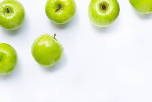 Green apples on white background. Copy space - Фото, зображення