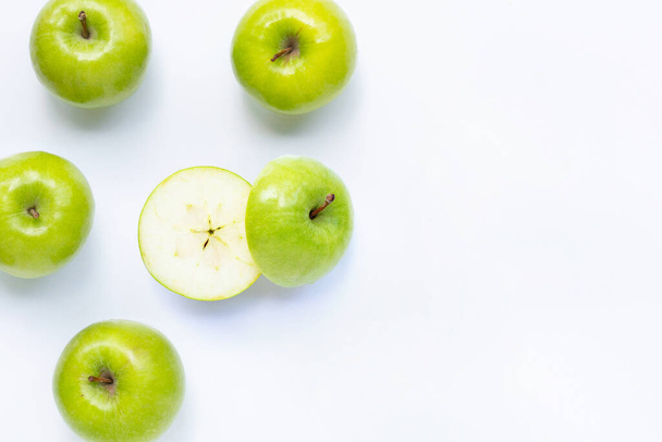 Green apples on white background. Copy space - 写真・画像
