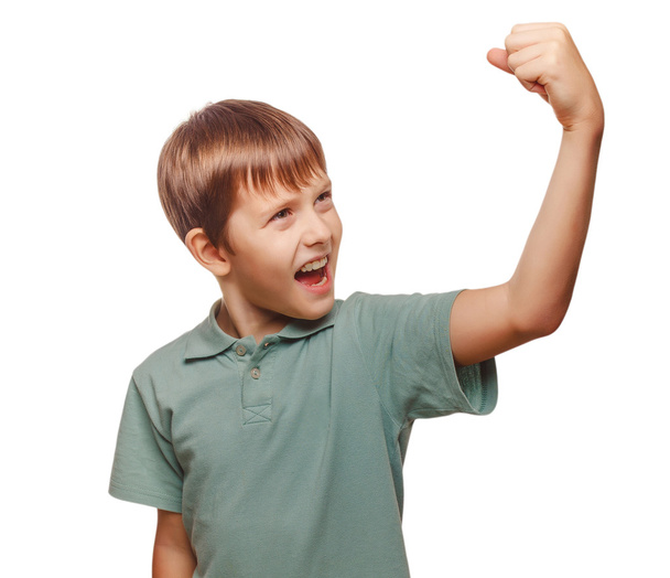 Teen excited happy teenage boy shows his hand so fists - Фото, зображення
