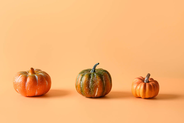 Thanksgiving day or Halloween different pumpkins harvest on orange. Space for text. - Fotoğraf, Görsel
