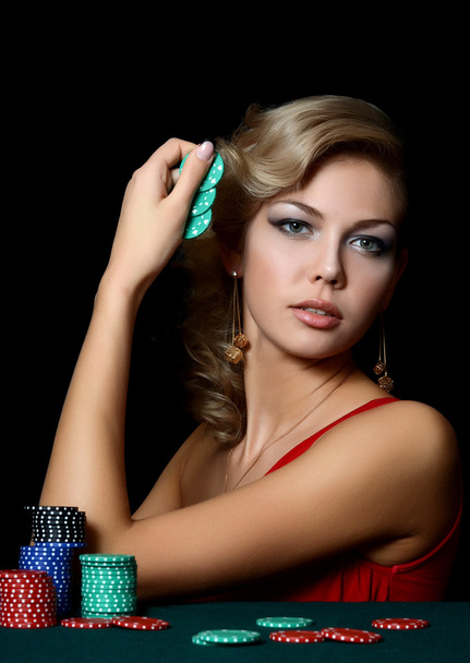 Woman with casino chips - Foto, afbeelding