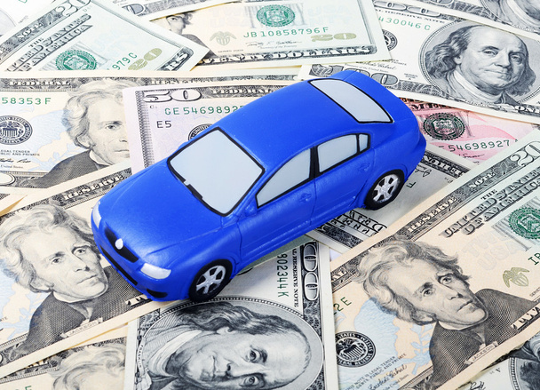 Toy car for dollar banknotes - Photo, image