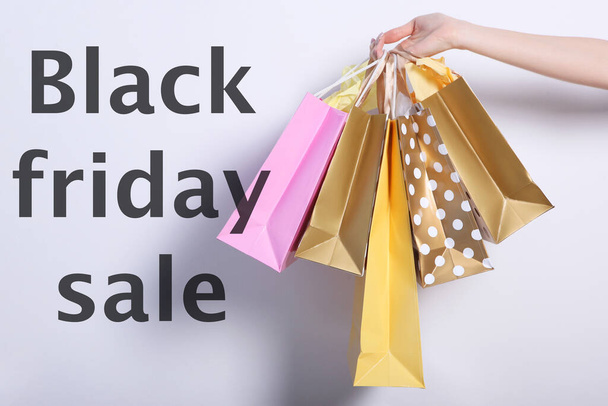 Black Friday concept. Sale, discounts, shopping, shopaholism - Foto, Bild