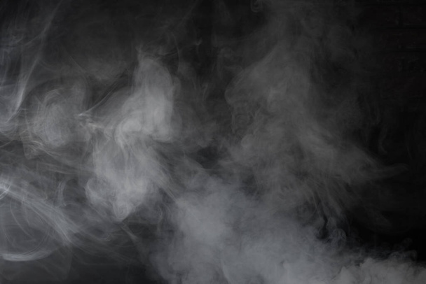 White smoke on black background - 写真・画像
