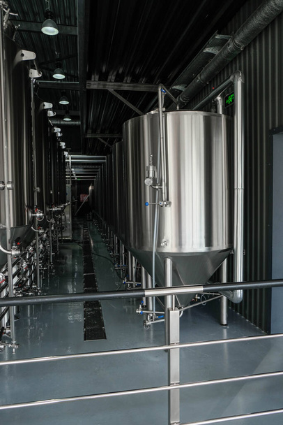 Modern craft brewery. Fermentation. Vertical image. - Fotografie, Obrázek