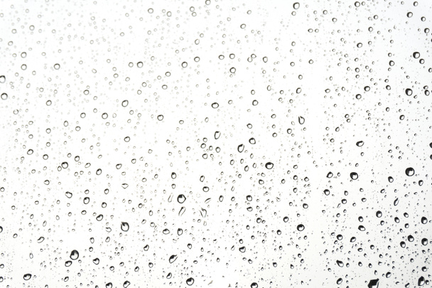 Krople wody na szkło. Krople deszczu na powierzchni okna - Zdjęcie, obraz