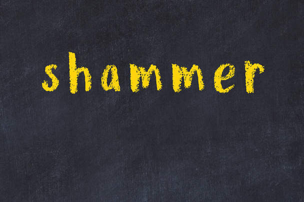 Κολέγιο γραφείο κιμωλία με τη λέξη shammer γραμμένο σε - Φωτογραφία, εικόνα