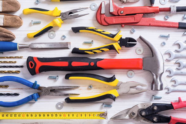 Set of hand tools . Equipment on wooden background - Foto, Bild