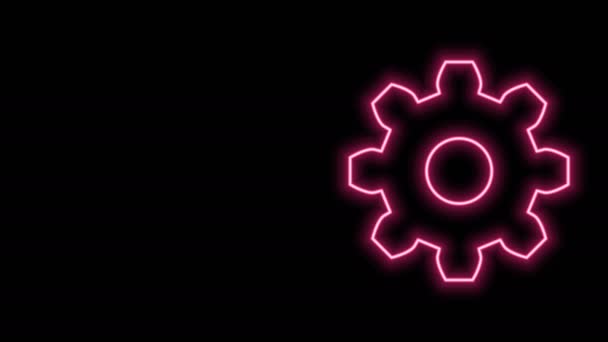 Zářící neonová čára Ikona ozubení izolovaná na černém pozadí. Značka nastavení ozubeného kola. Symbol kolečka. Grafická animace pohybu videa 4K - Záběry, video