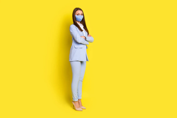 Full body photo chief agent girl cross hands stand copyspace ready work office covid quarantine wear medical safe mask blue jacket trousers high-heels isolated bright shine color background - Foto, Imagen