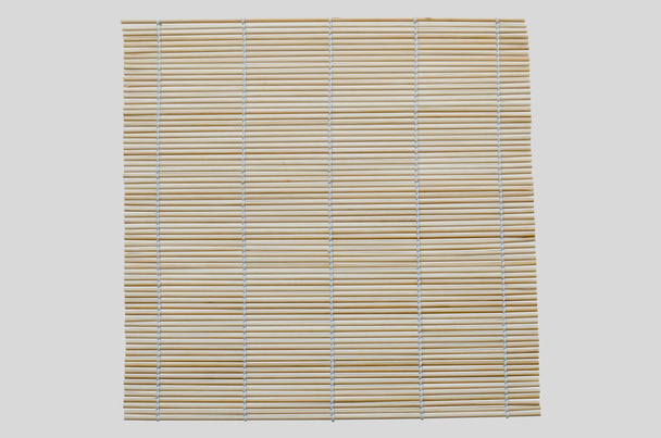 Tapete de bambu isolado sobre fundo branco. - Foto, Imagem