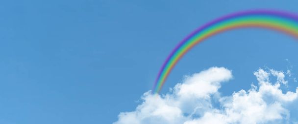 white cloud and blue sky and  rainbow background with copy space - Photo, Image