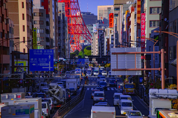 A traffic jam at the urban street behind Tokyo tower long shot - Photo, Image