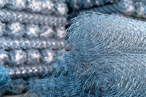 Rolls of steel wire mesh for construction work in warehouse - Photo, Image
