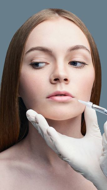 Closeup of rejuvenation lip. Beauty female face. Plastic surgery. Healthcare - Photo, Image