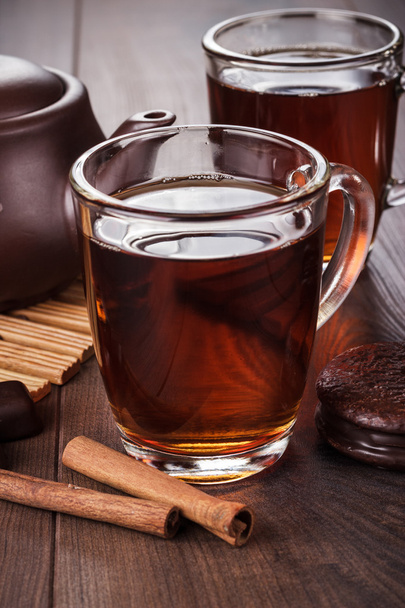 Cup of tea with cinnamon sticks - Zdjęcie, obraz