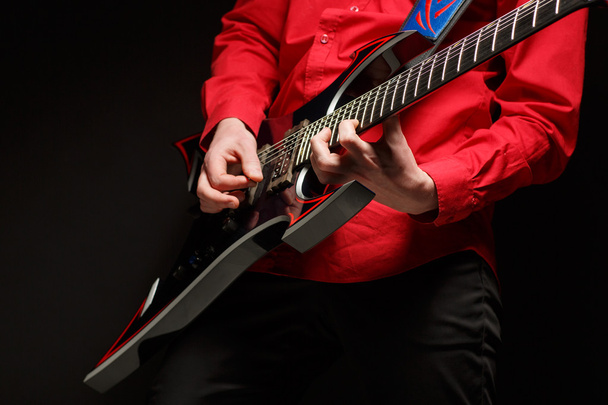 Rock guitarist plays solo guitar - Photo, Image