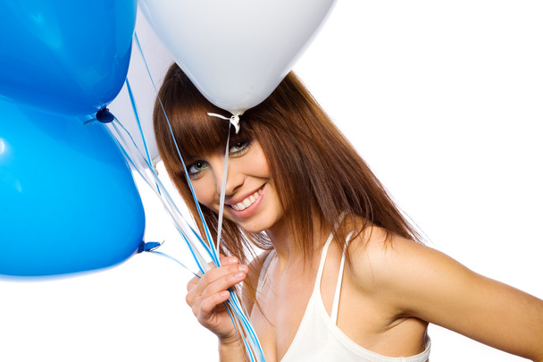Woman holding ballons - Foto, afbeelding