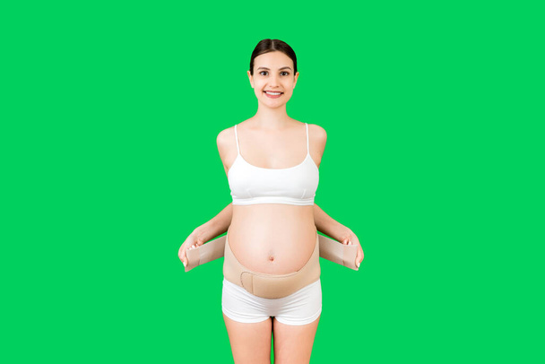 Back View Of Pregnant Woman In Underwear Dressing Orthopedic