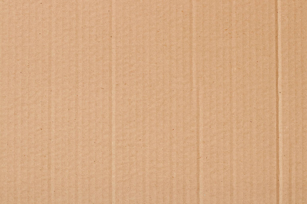 Brown cardboard sheet abstract background, texture of recycle paper box in old vintage pattern for design art work. - Photo, Image