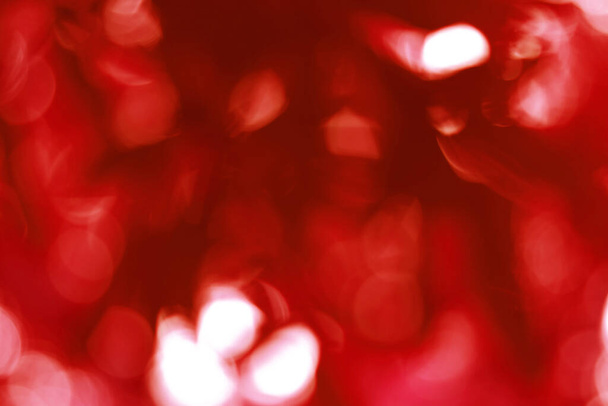 赤ぼっくりの背景、クリスマスとバレンタインデーのためのぼやけた明るい光の抽象. - 写真・画像