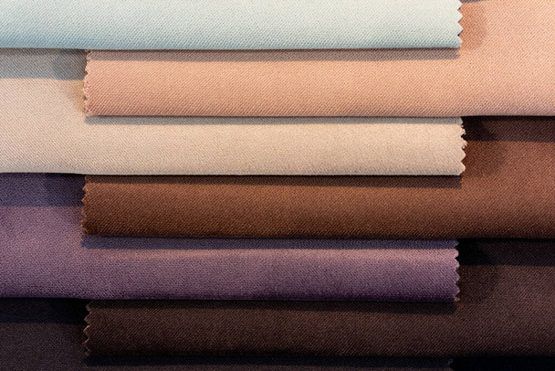 Каталог зразків різнокольорової тканини. Тло текстильної промисловості
.  - Фото, зображення