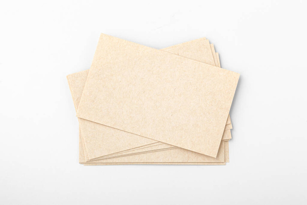 Business card, eco paper on white background, top view - Φωτογραφία, εικόνα