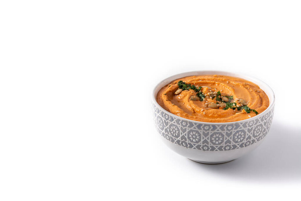 Pumpkin hummus in bowl isolated on white background.Copy space - Photo, Image