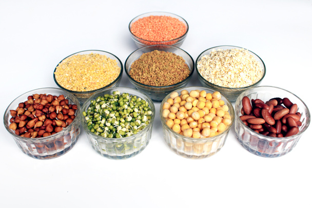 Collection of legumes (chickpeas, green peas, Pink lentils, Indian lentils, red beans, green mung beans, Dry peas, Pigeon Peas, Red Kidney, Fenugreek Seed, Oatmeal) isolated on white background. - Photo, Image