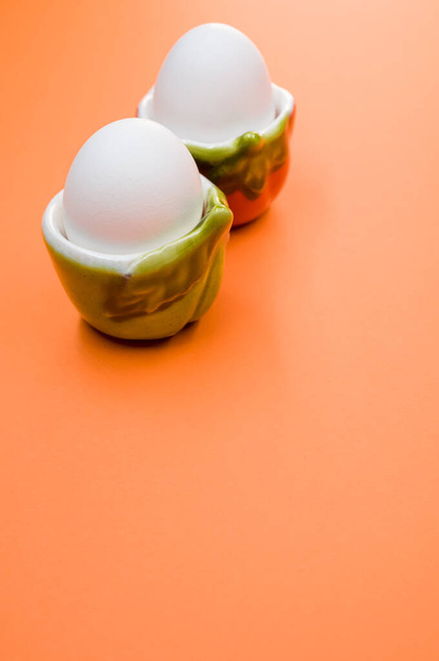 A vertical shot of white eggs - Фото, изображение