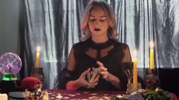 Gypsy fortune teller shuffling occult tarot cards. Magical pagan destiny reading ritual. - Footage, Video