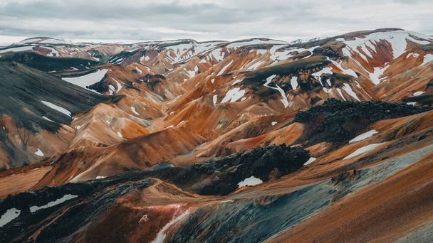 Landmannalaugar rainbow mountains from the birds eye view. Drone photography in the Highlands of Iceland. Tourism in Iceland - Photo, Image