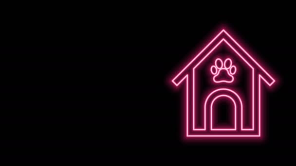 Hehkuva neon line Koira talo ja tassu tulostaa lemmikki kuvake eristetty mustalla taustalla. Koirankennel. 4K Video motion graafinen animaatio - Materiaali, video