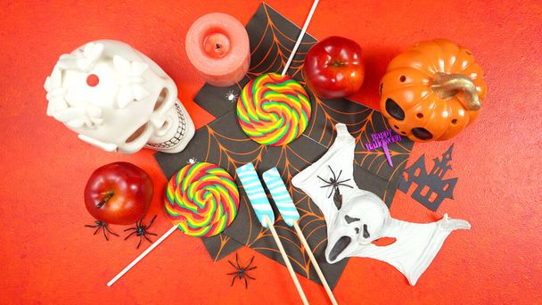 Halloween Trick or Treat desktop background blog header overhead flat lay. - Foto, imagen