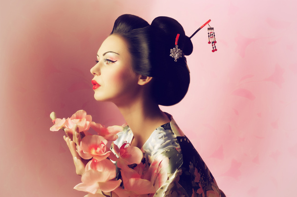 Portrait of a Japanese geisha woman - Photo, Image