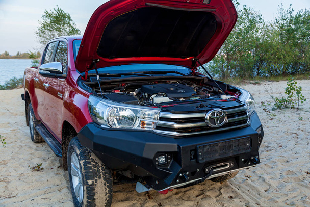 Ukraine Kiev October 10, 2020: interior design of Toyota Hilux new 4x4 pickup with double cab, with reinforced metal bumper and winch. Japanese car brand. - Foto, imagen
