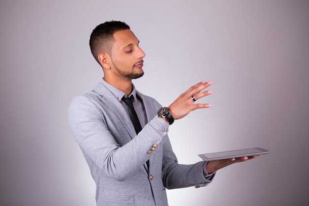 African American business man using a tactile tablet - Black peo - Fotografie, Obrázek