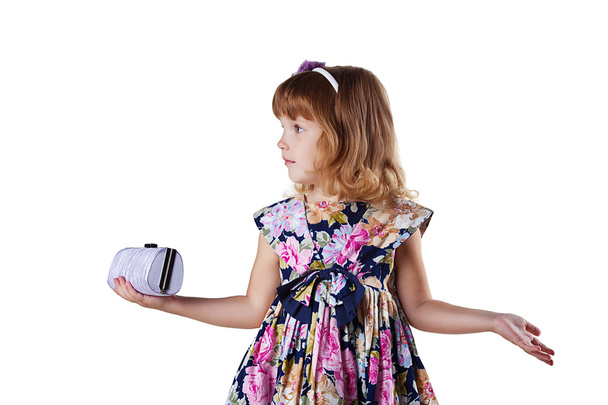 Little girl with a bag in hands - Φωτογραφία, εικόνα