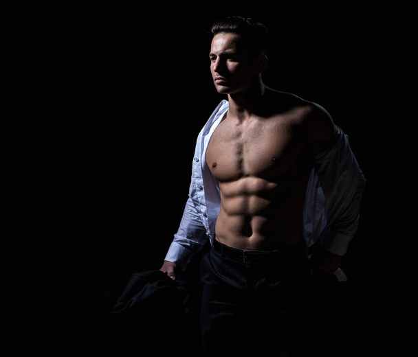 Strong man showing his perfect naked body. Bare torso. - Fotó, kép