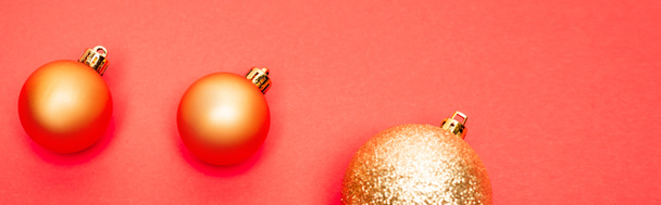 top view of shiny baubles on red background, banner - Photo, Image