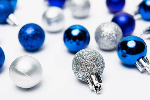 blue, silver Christmas decoration on white background - Valokuva, kuva